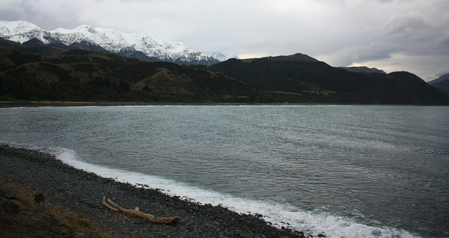 Kaikoura mountains over the Pacific, on KiwiRail Coastal Pacific train, Picton to Christchurch, South Island, New Zealand, fotoeins.com