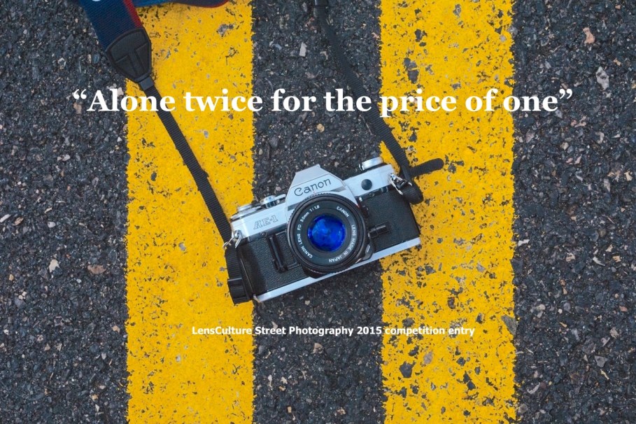 Pexels (https://www.pexels.com/photo/black-and-gray-canon-digital-camera-on-black-and-yellow-surface-94739/), CC0 license